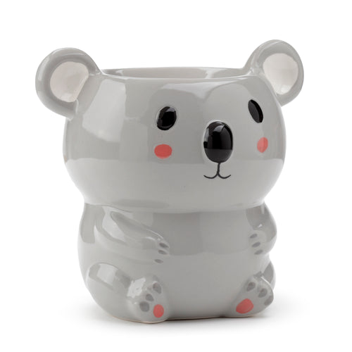 Front view of a grey ceramic koala oil burner, featuring black eyes, nose, and pink blush marks.