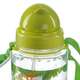Angled close-up of a children's water bottle, showing its bright lime green domed lid with a push-button mechanism, a green woven carry strap, and the clear bottle body with a colourful patterned design.
