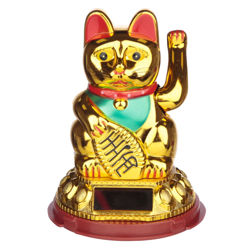Front view of a golden waving lucky cat Maneki Neko figure, featuring red ears and collar, a green bib, and a black solar panel on its base. It has its right paw raised and holds a gold coin with Japanese characters.