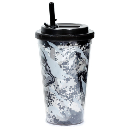 Angled view of a clear double-walled cup with a black lid and straw. It contains floating black and grey hexagonal glitter, and features grey and black Stormtrooper helmet graphics and text.