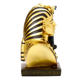 Right side view of a decorative gold and black Egyptian Tutankhamen bust ornament with striped headdress and hieroglyphic base.