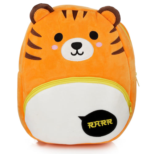 Front view of an orange plush tiger rucksack backpack on a white background, featuring brown ears and stripes, embroidered black eyes, nose, mouth, pink cheeks, and a yellow-zippered front pocket with a black 'RARR' speech bubble.