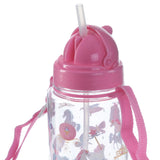 Close-up, angled view of a children's clear water bottle featuring a pink lid, transparent straw, and pink carry strap. The bottle's side displays a colourful unicorn and fantasy design, including carriages and crowns.