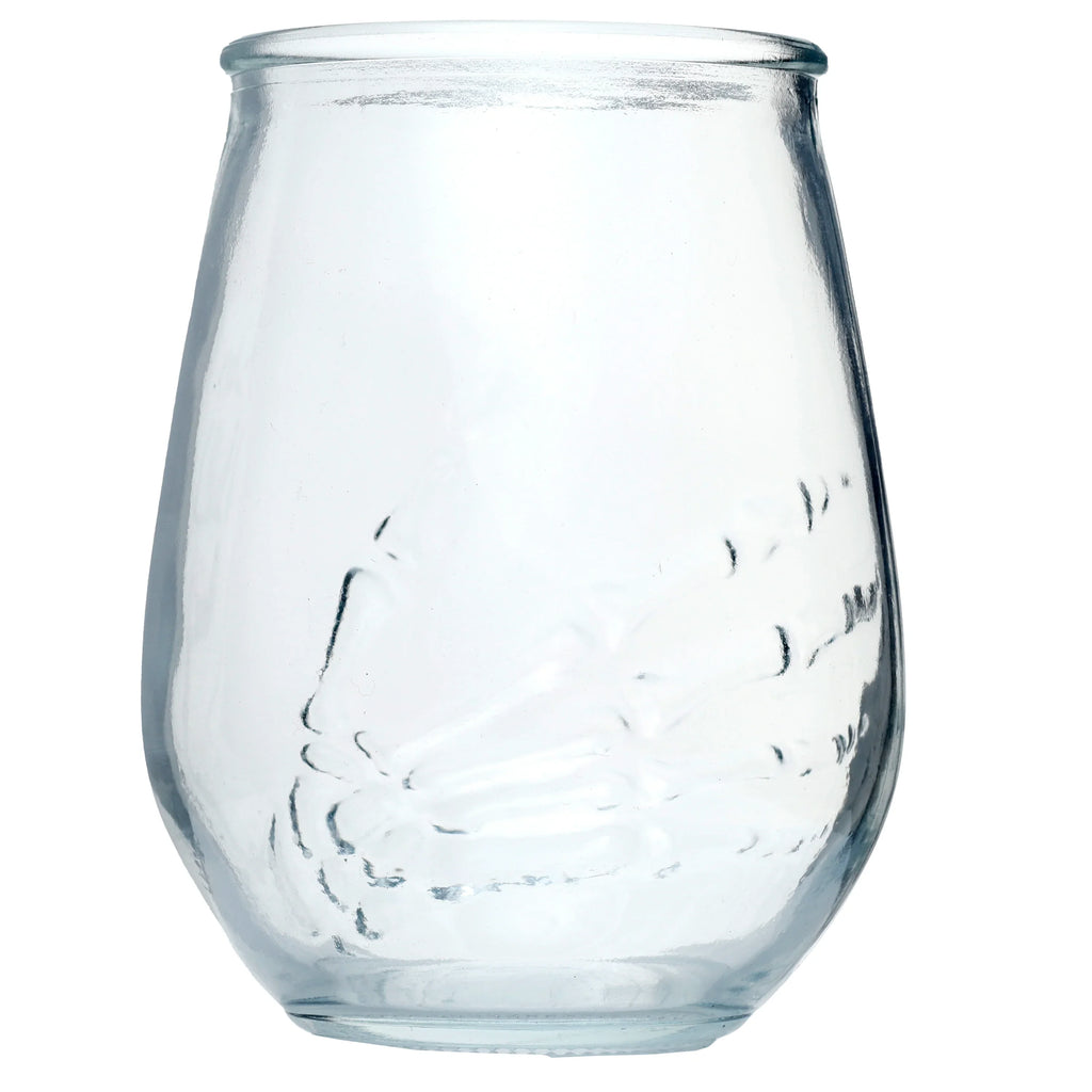 Front view of a clear glass tumbler with an embossed skeleton hand design.
