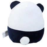 Back view of a black and white panda plush toy, with a rounded white body, black lower section, black ears, and a fluffy white tail.