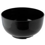 Elevated angled view of a single black, round, glossy bento lunch box component bowl with a flat base.