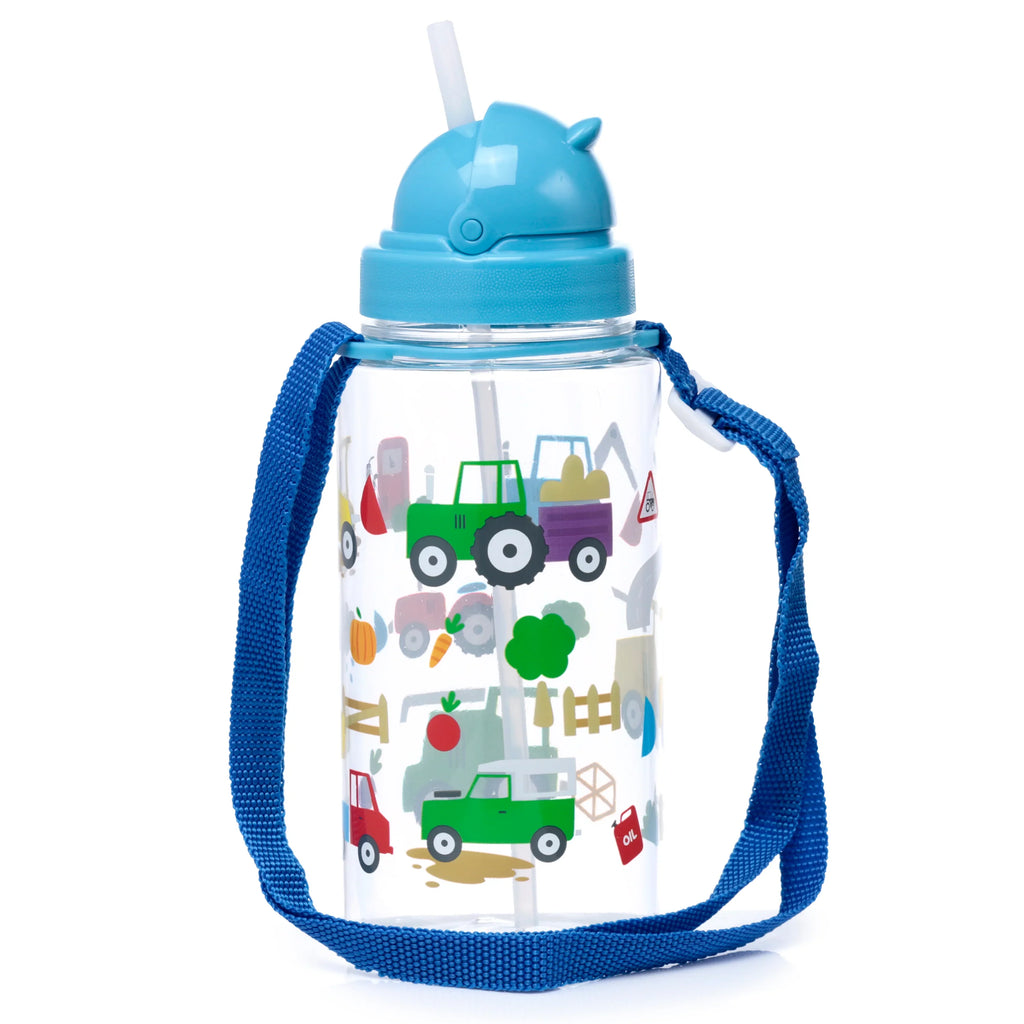 A clear children's water bottle with a blue sippy lid, a visible white straw, and a blue fabric carrying strap. The bottle features colourful illustrations of green, red, and purple tractors, various farm vehicles, pumpkins, and carrots.