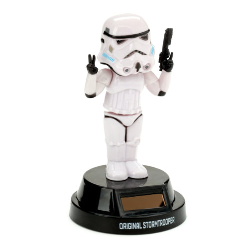 Front view of a collectable white Original Stormtrooper Peace Solar Pal, depicting the figure holding a black blaster and making a peace sign, standing on a black base with a solar panel.