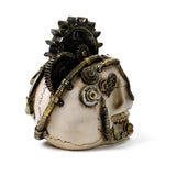 A steampunk skull figurine, depicted from an angle showing its right side and top from behind, adorned with bronze and dark metallic cogs, springs, and gears.