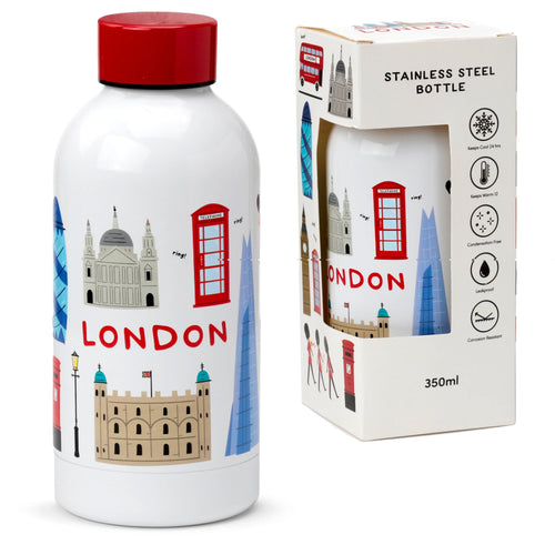 Angled view of a white 350ml reusable stainless steel insulated drinks bottle with a red screw cap. It features a colourful London souvenir design, including illustrations of St Paul's Cathedral, Tower of London, a red telephone box, double-decker bus, The Gherkin, The Shard, and 'LONDON' text. A white product box with a window showing another similar bottle, London illustrations, and 'STAINLESS STEEL BOTTLE 350ml' text is positioned behind it.
