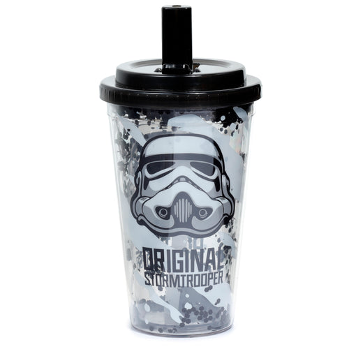 Front view of a clear double-walled Stormtrooper cup with a black lid and straw. It features a grey and black Stormtrooper helmet design with 'Original Stormtrooper' text, and black hexagonal glitter between the walls.