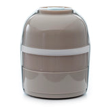 Front view of a glossy taupe round stacked bento lunch box with two tiers, held together by a light blue elastic strap and a lighter band between the sections.