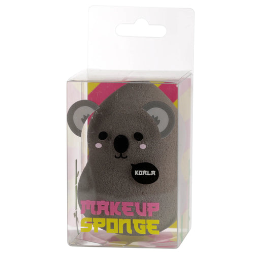 Front view of a grey koala makeup sponge with black eyes, nose, mouth, pink cheeks, and KOALA speech bubble, presented in clear packaging with colourful 'Makeup Sponge' text.