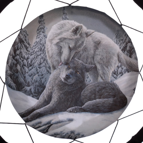 Close-up of a dreamcatcher's central disc, depicting a light grey wolf licking a dark grey wolf in a snowy forest scene.