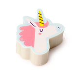 Angled view of a unicorn head shaped eraser with pink mane, yellow horn, and light blue outline.