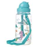 Angled view of a clear children's water bottle with a turquoise flip-top lid, integrated straw, and an adjustable fabric strap. The bottle is decorated with colourful sealife illustrations, including a shark, purple seahorse, and small fish.