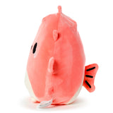 Angled view of Puff the Pufferfish, a coral pink and white Squidglys plush toy, showing one embroidered black eye and a black-detailed tail fin.