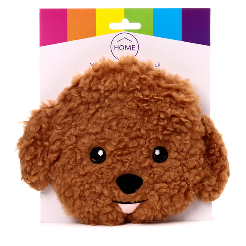 Front view of a brown, fluffy Cavapoo dog head microwavable heat pack, with black eyes, a black nose, and a pink tongue, presented on a white backing card with a rainbow-coloured top section.