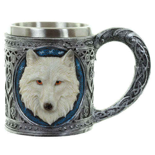 Front view of a decorative tankard, featuring a raised white wolf's head with bright orange eyes on a textured blue background. The tankard's silver-grey body and handle are adorned with intricate Celtic knotwork designs.