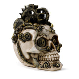 Angled view of a beige steampunk skull ornament, detailed with intricate bronze-coloured cogs, gears, and coiled springs.