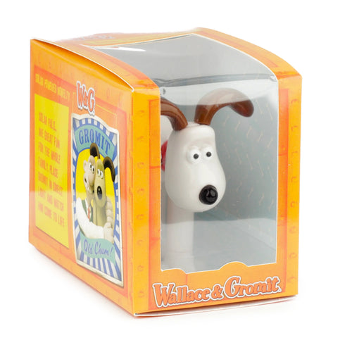 Angled view of a licensed collectable solar-powered Gromit Pal figure, in an orange display box with a clear window, showing its white head, brown floppy ears, and black nose.